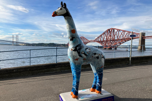 Giraffe About Town Auction